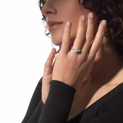 Joy pear-cut solitaire ring, medium model