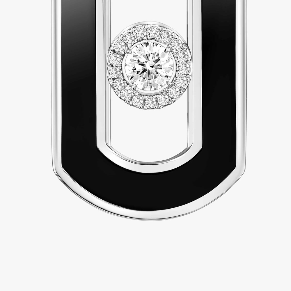 So Move Ohrhänger Onyx So Move Ohrringe aus 18 Karat Weißgold und Onyx mit Diamanten ausgefasst und mit einem beweglichen Diamanten im Brillantschliff in der Mitte, von einer Diamantumrandung in Szene gesetzt.