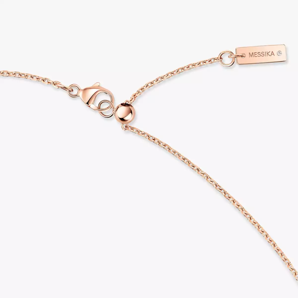 Collier pendentif Moderniste Collier Moderniste en or rose 18 carats, pavé de diamants. Ajustable grâce à son fermoir coulissant.
