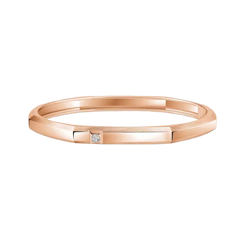 Bracelet Moderniste, moyen modèle Bracelet Moderniste en or rose 18 carats, serti d'un diamant taille brillant. Finition polie miroir sur le dessus.